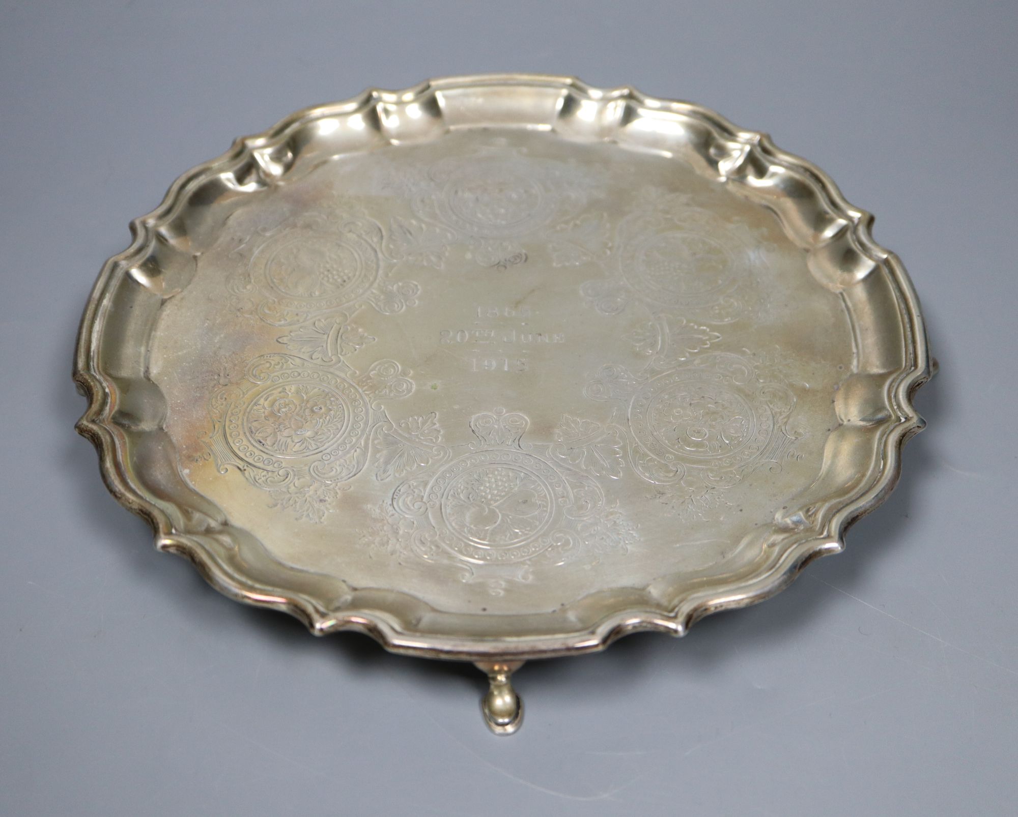 A George V silver salver, with engraved inscription, Barker Brothers, Chester, 1914, 20.7cm, 11oz.